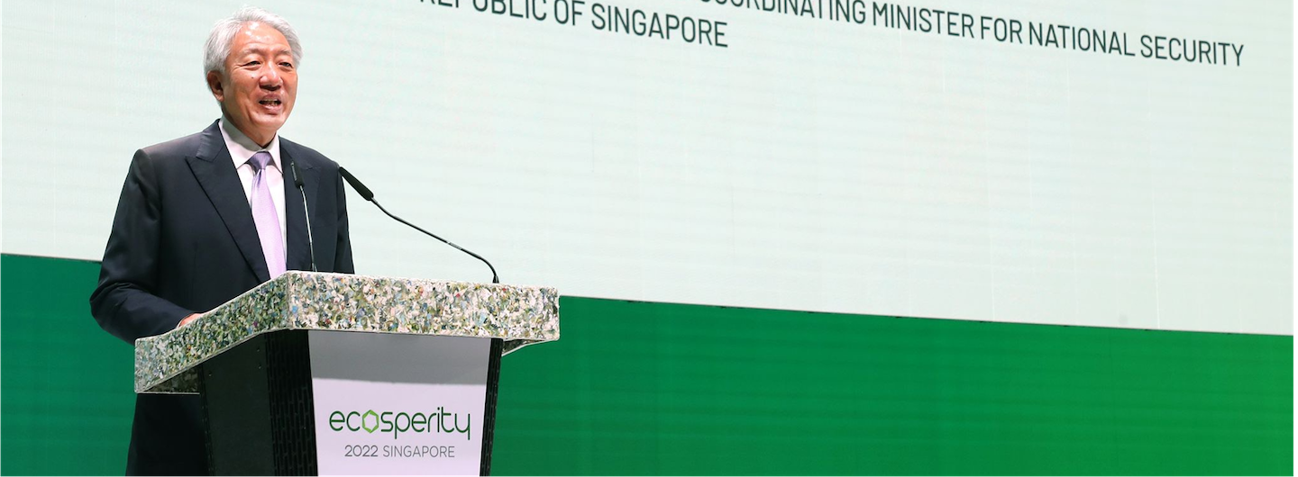 Asian man at "ecosperity 2022 Singapore" podium with microphone, Republic of Singapore text behind him.